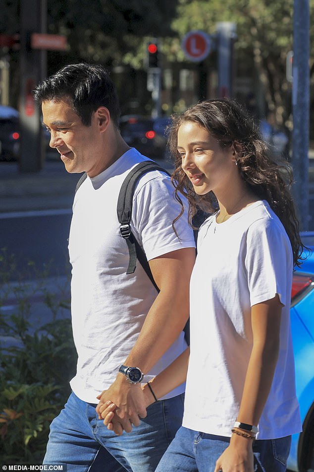 The couple sported matching outfits as they stepped out for a morning stroll together in Sydney.