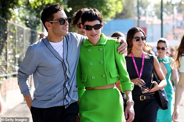 Rami held his lover close as they walked through the crowds in the Italian city, ready for another day of star-studded events.