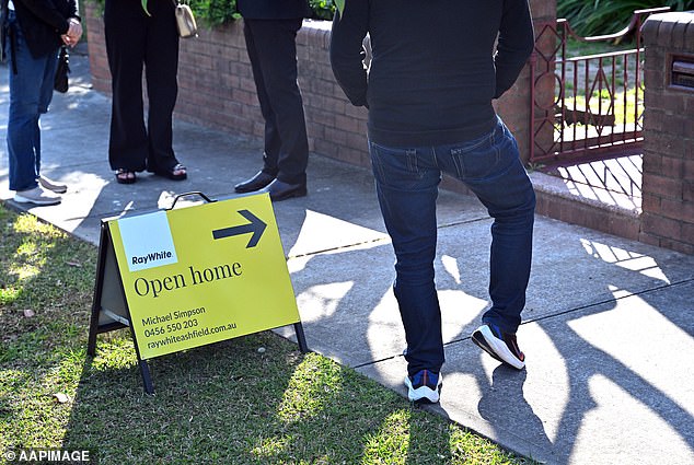 Mansour Soltani, mortgage loan expert at financial comparison site money.com.au, urges first-home buyers to do their research so they don't get carried away by their feelings about a property (pictured, buyers at an open house)