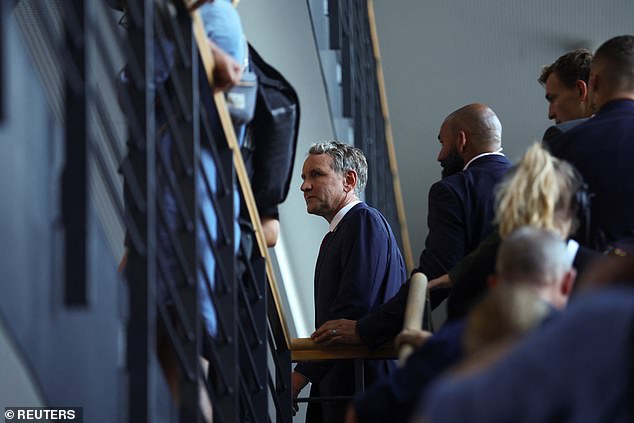 Bjorn Hocke, member of Alternative fur Deutschland (AfD), walks up the stairs after the first exit polls in the Thuringian state elections