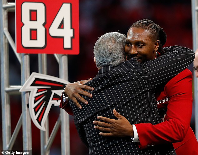 White was inducted into the Falcons Ring of Honor in 2019 (seen with owner Arthur Blank)