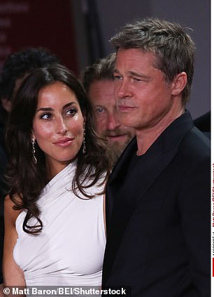 Inés de Ramón and Brad Pitt at the premiere of Los Lobos