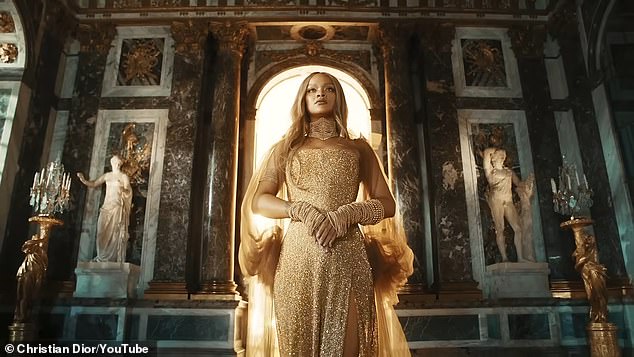 In the one-minute ad, the 36-year-old Barbadian billionaire was transformed into a golden goddess reigning over the Palace of Versailles while wearing a sparkling corseted gown and stiletto heels selected by Dior creative director Maria Grazia Chiuri.