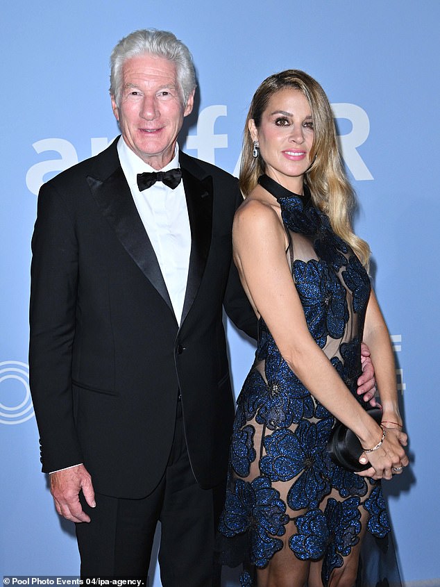 Alejandra later changed into a semi-sheer mesh dress with navy floral detailing as the trio headed to the amfAR gala.