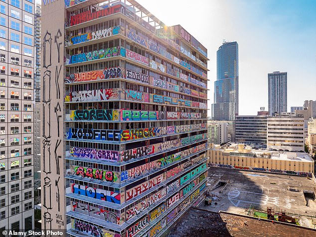 Florida condo owners recently began cutting prices by as much as 40 percent in an effort to avoid the massive repair costs that are looming. (Pictured: The graffiti-filled Vitas building)