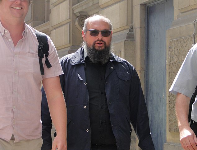 The Italian-born priest pictured arriving at City of London Magistrates' Court