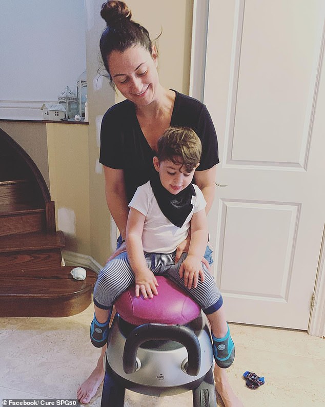 When her son was diagnosed in 2018, she was told the boy would be paralysed from the waist down by age ten and a quadriplegic by age 20. Georgia Pirovolakis is pictured here with her son.