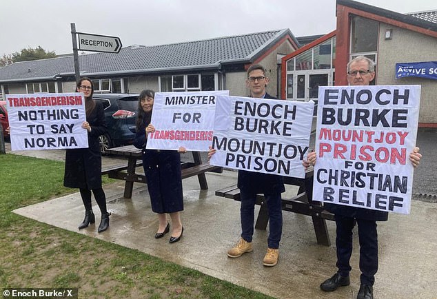 Enoch Burke's mother, father, sister and brother were seen protesting outside Ballinrobe Community School in November on the day Education Minister Norma Foley visited.