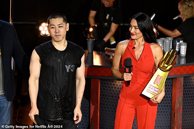 Kobayashi (left), one of the most successful competitive eaters of all time, was eventually defeated by Chestnut.