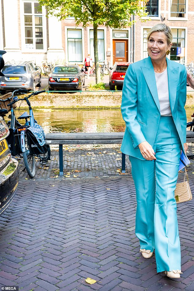 Máxima smiled for the cameras as she headed to the Door Het Geluid Foundation