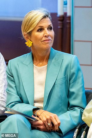 Máxima seemed to be absorbed in the workshop.