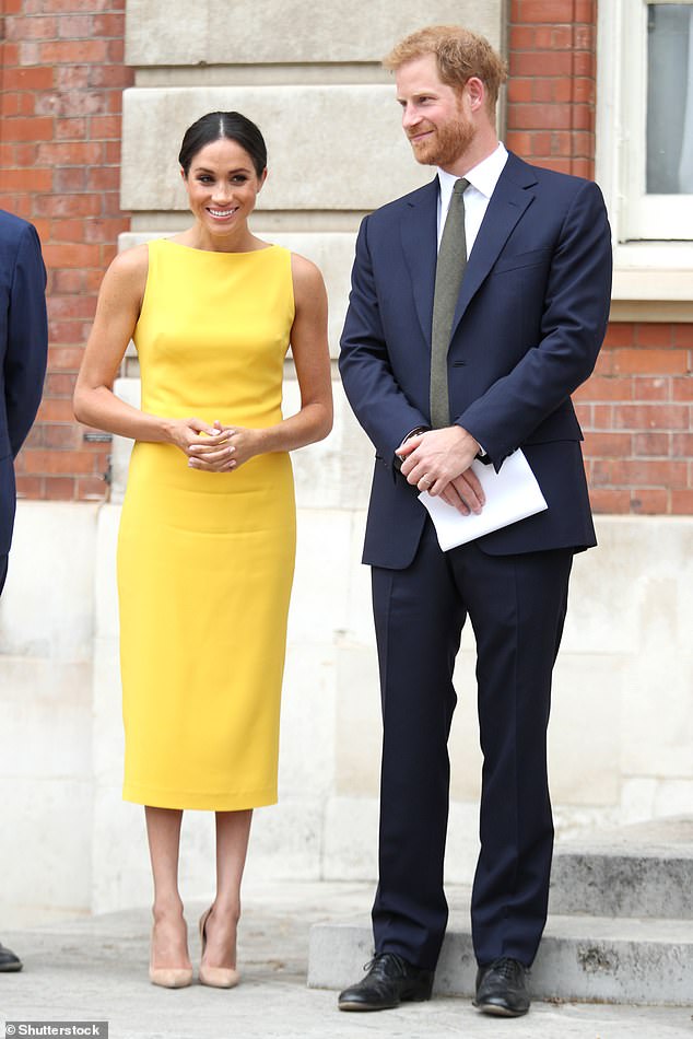 The Duke and Duchess of Sussex pictured in 2018 attending the Your Commonwealth Youth Challenge reception at Marlborough House, London in 2018