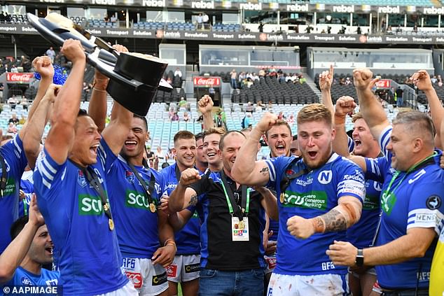 The Newtown Jets celebrate their victory over the Burleigh Bears in the 2019 State National Championship