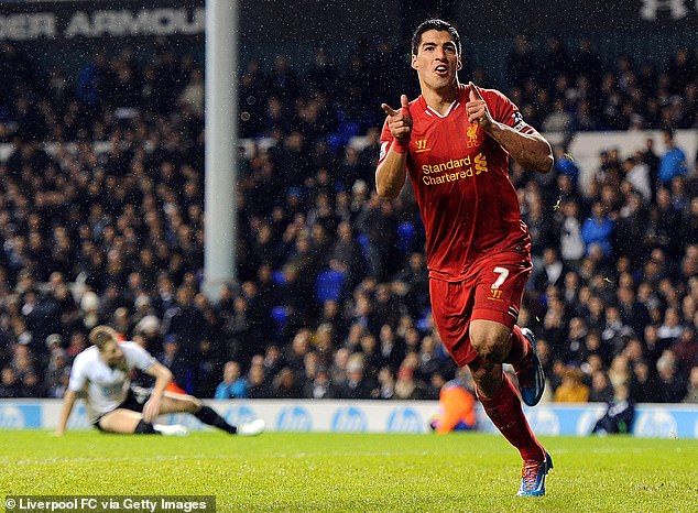 Suarez celebrates scoring for Liverpool at White Hart Lane against Tottenham Hotspur in 2013