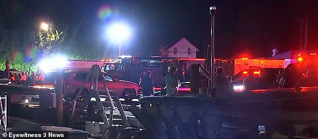 The high-speed crash left the boat broken into pieces and all passengers in the water, according to Joey Kellems of the U.S. Coast Guard's Long Island Sound Sector. (Pictured: Search and rescue teams in port)