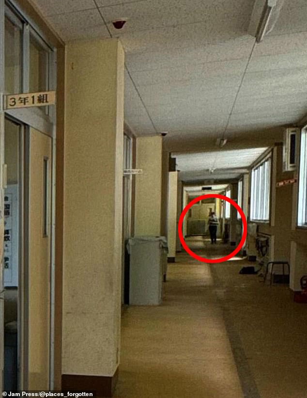 A chilling image shows a figure wandering in the shadows of an empty hallway.