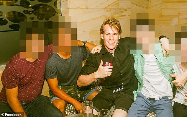 Davies (centre) claims he was suffering from psychosis at the time of the incident and did not know what he was doing.