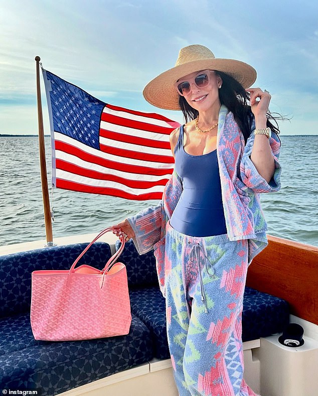 The Skinnygirl founder was also spotted on a boat with her Goyard designer bag.