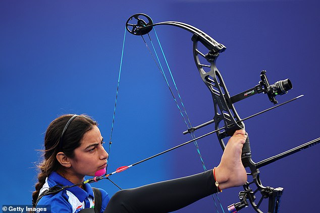 He first raises the arrow into place using his right foot before raising the bow, which has been balancing on his left knee, with the same foot.