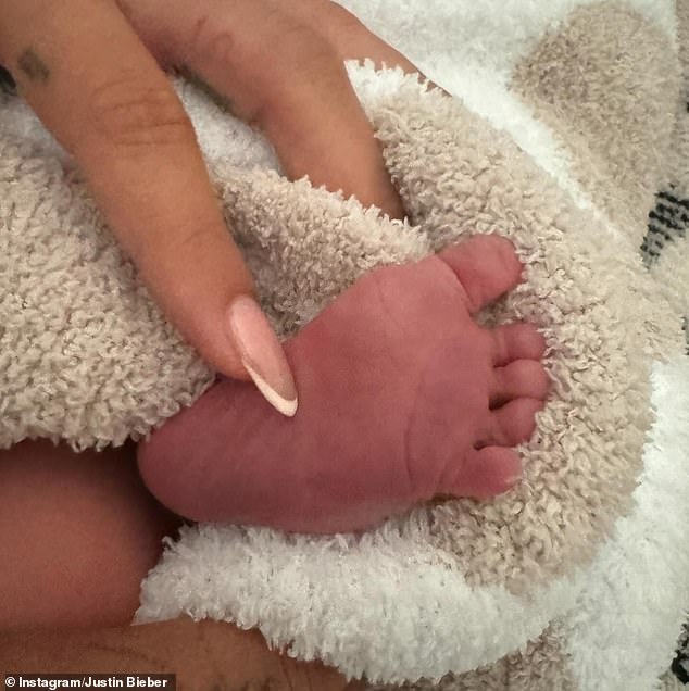 Beliebers got a glimpse of the pop star's baby's tiny foot and Hailey's hands.