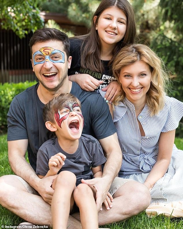 President Zelensky is pictured with his family in March 2022. When the photograph was taken, Zelensky's son Kirill was nine years old and his daughter Aleksandra (back) was fifteen. Olena Zelenska, President Zelensky's wife, is on the right.