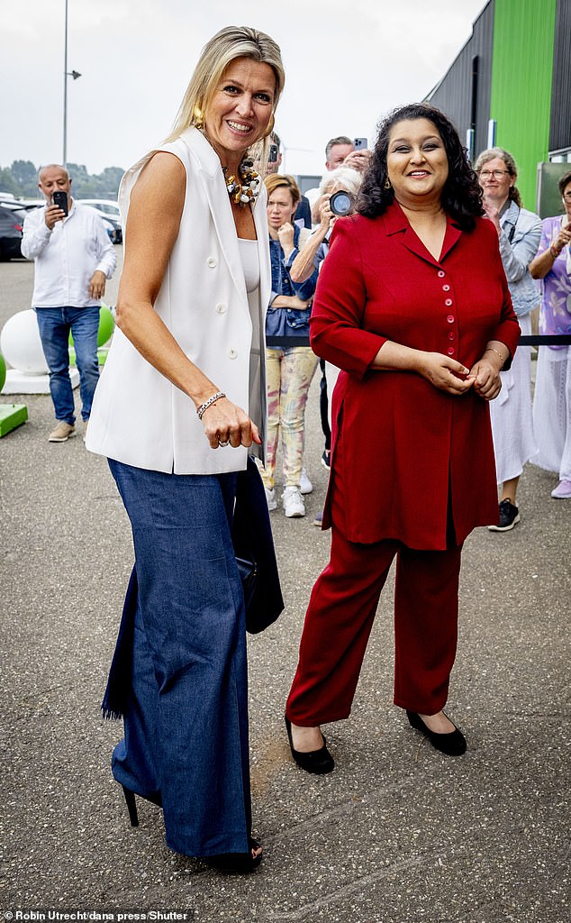 Maxima, who shares three daughters with King Willem-Alexander, 57, looked chic in a white vest which she paired with blue flared trousers.