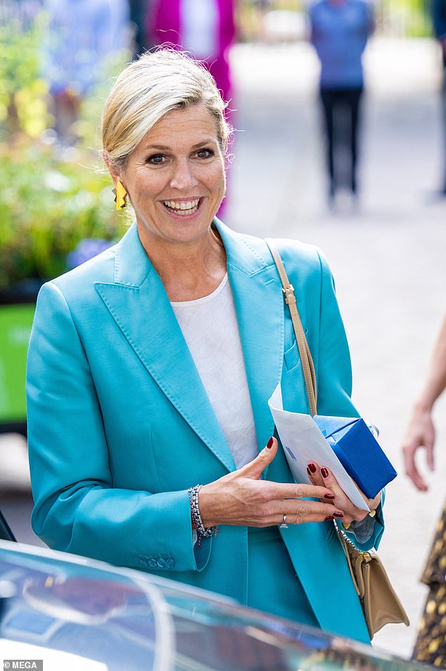 It's been a busy week for the royal, who looked dapper in a striking suit as she met students in Leiden yesterday.