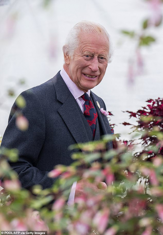 King Charles III smiles during a visit to the Royal Horticultural Society's 200th Flower Show in Aberdeen on August 31 this year