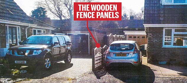 The Batesons arrived home to find fencing panels being installed between their driveways.