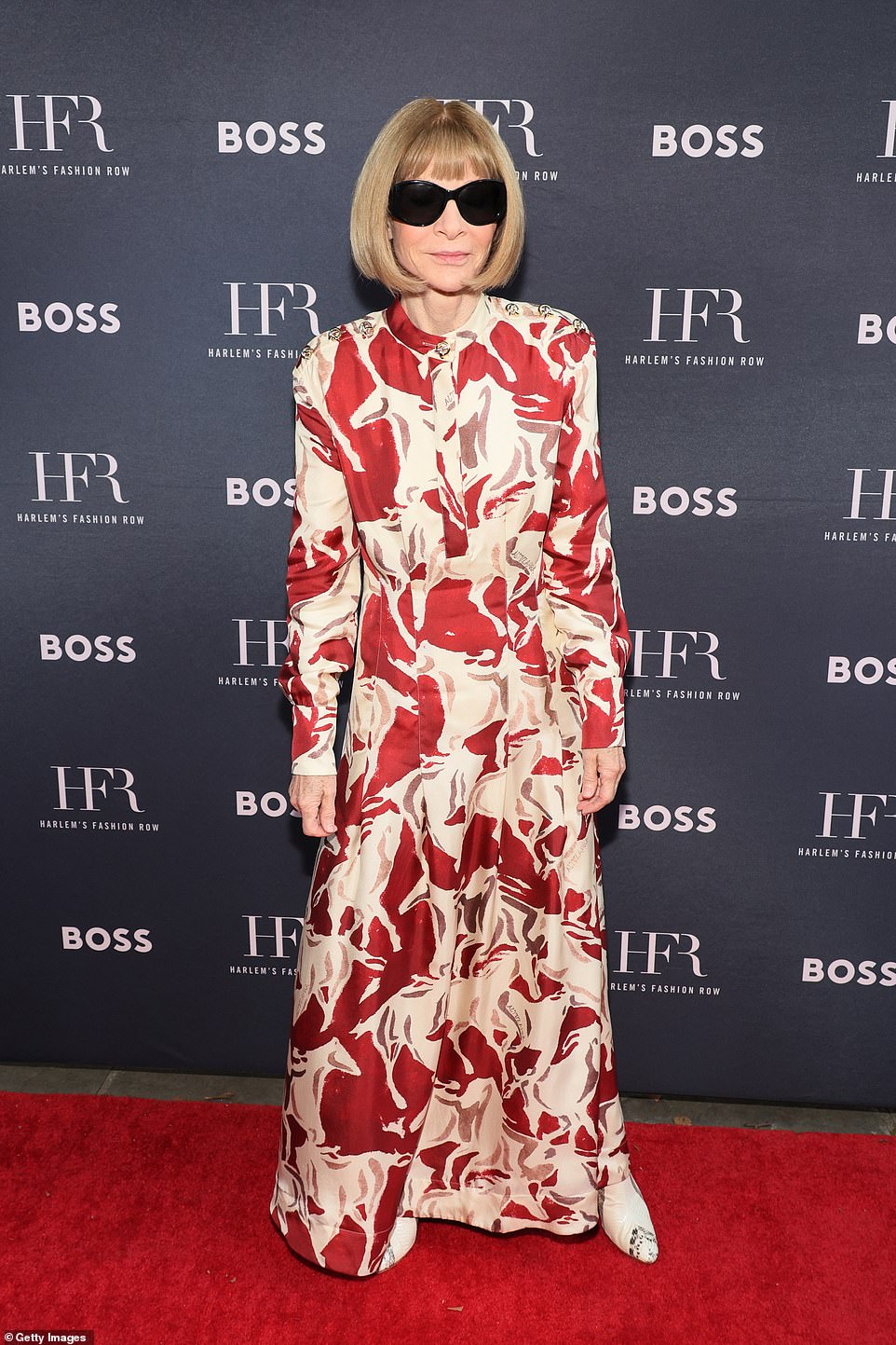 Vogue editor-in-chief Anna Wintour, 74, was also in attendance and showed off her understated style in a red and cream horse-print dress.