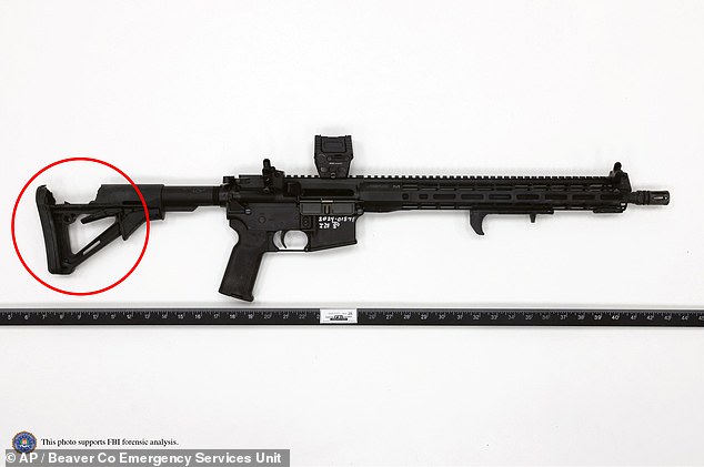 Newly released images of Crooks' AR-style rifle show the butt of the firearm with a large hole where the bullet struck near the shooter's shoulder.