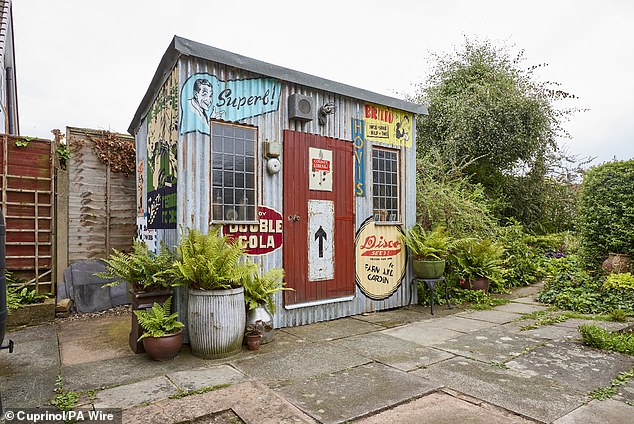 The shed, named Wrinkly, Rusty And Retro, was built entirely from used and scrap materials, including corrugated steel.