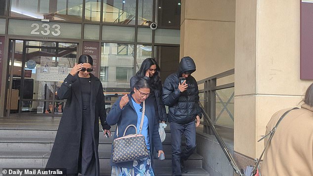 Moses Thurairajasingam's family faced a media mob as they left a Melbourne court on Wednesday