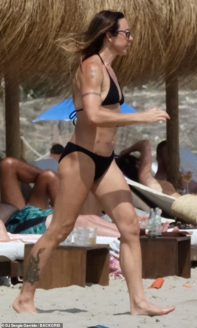 The Spice Girl, 50, has been soaking up the sun on the Balearic island with her boyfriend Chris Dingwall, with whom the singer went public with her relationship in June.