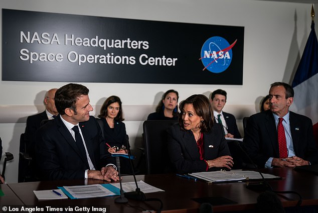 Vice President Kamala Harris is flanked by French President Emmanuel Macron and National Security Adviser Phil Gordon (right) as they attend a meeting