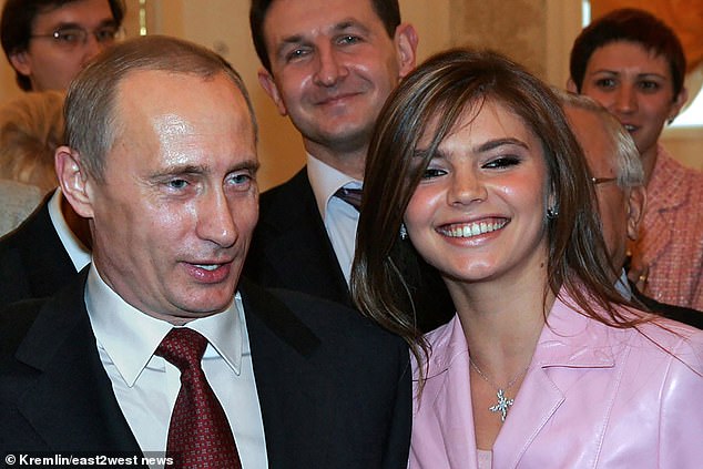 Alina Kabaeva and Vladimir Putin at an event in the Kremlin