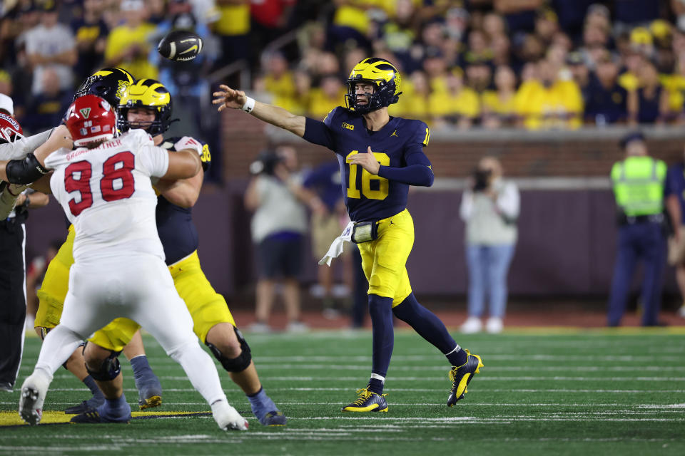 ANN ARBOR, MICHIGAN - AUGUST 31: Davis Warren #16 of the Michigan Wolverines throws a pass in the second half while playing against the Fresno State Bulldogs at Michigan Stadium on August 31, 2024 in Ann Arbor, Michigan. (Photo by Gregory Shamus/Getty Images)