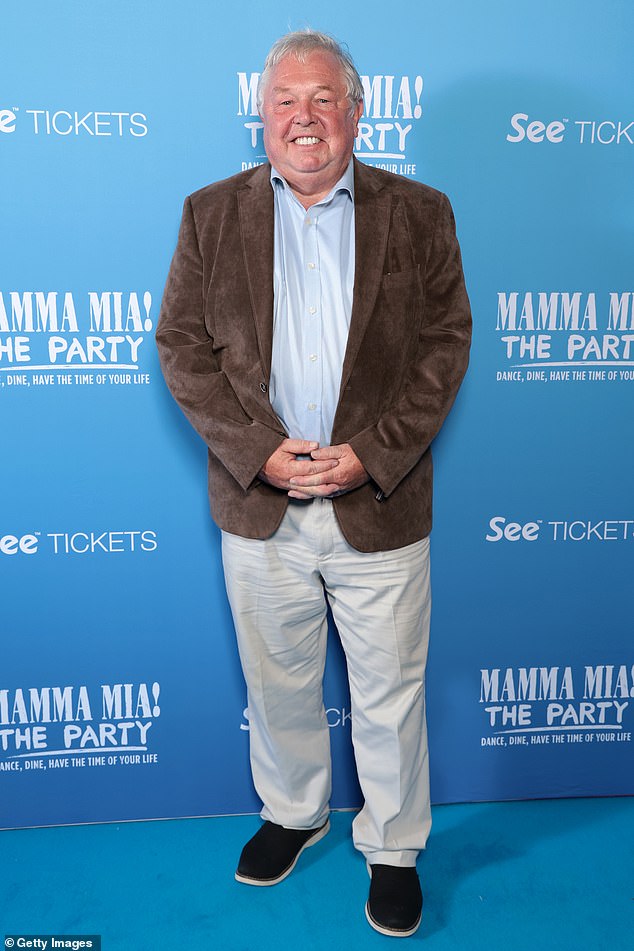 Radio host Nick Ferrari, 65, put on a stunning display in a flared blazer, blue shirt and blue trousers.