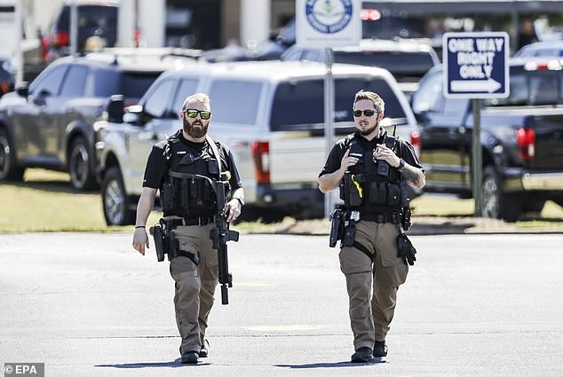 Police first received reports of the shooting at the high school around 10:20 a.m. Eastern Time.