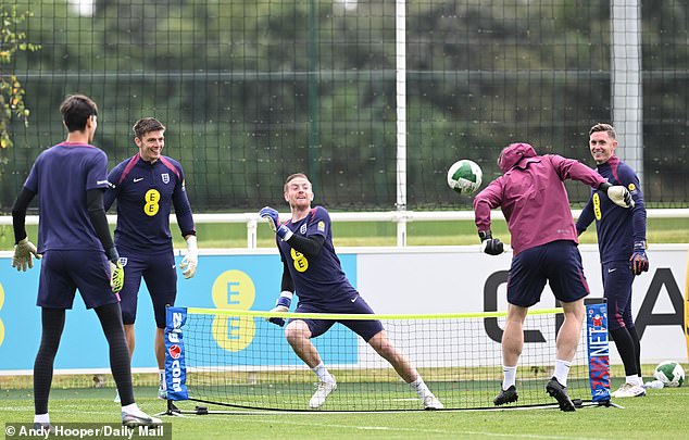 England's goalkeepers, including Everton's number one Jordan Pickford (centre), played football and tennis.