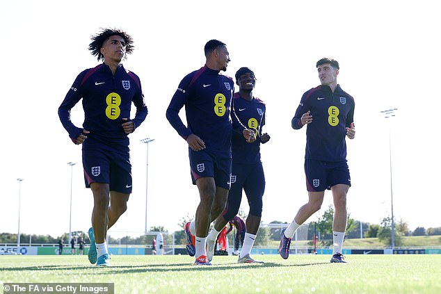 Rico Lewis, Levi Colwill, Madueke and Livramento pictured (left to right) jogging in Burton