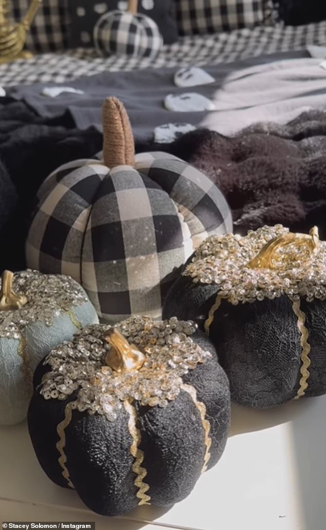 Scattered around the bed were an assortment of black and white fabric pumpkins, a pack of five of which cost £12.