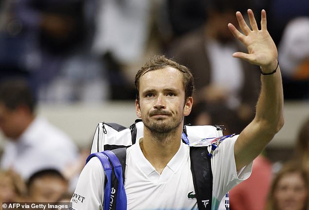 The Russian, cheered on by the crowd in New York, waves to fans after his defeat