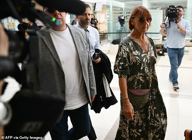 Gisele Pelicot arrives at the courthouse on Monday for the trial of her husband Dominique, accused of drugging her for almost ten years and inviting 50 strangers to rape her at their home in the south of France.