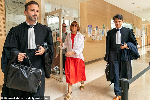 Wearing a long orange dress, a white blouse and a gold necklace, Madame Pelicot sat with her head held high in the same courtroom as the 51 men accused her of raping her.