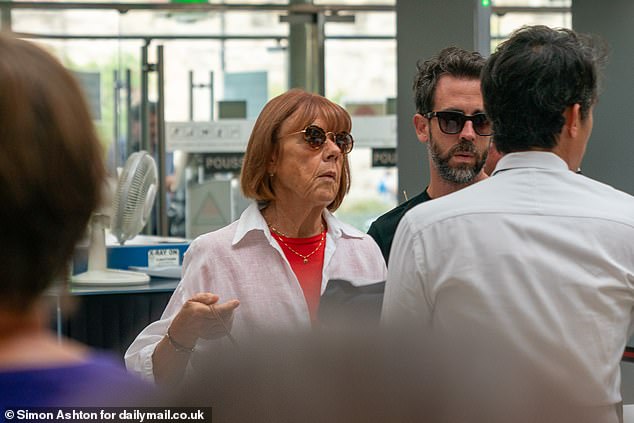 Madame Pelicot is pictured above as she arrived at court this morning.