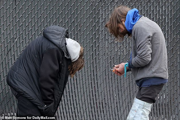 Xylazine depresses the central nervous system, causing users, like these in Philadelphia's Kensington neighborhood, to appear zombie-like.