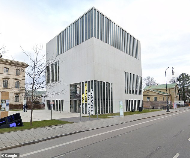 Armed police shot dead a suspected attacker in Munich after shots were fired this morning outside the city's Nazi Documentation Centre (pictured)