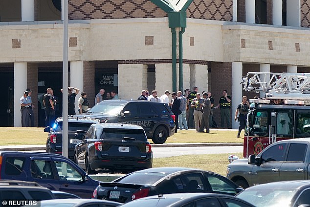 A large police presence descended on Apaleechee High School in Winder, Georgia, on Wednesday after at least 13 people were shot, four of them fatally.