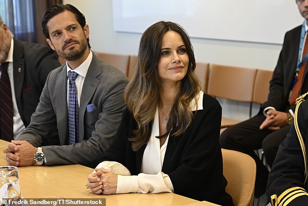 Sofia looked sweet and demure as she stood next to her husband, clasping their hands together as she listened to the staff members.